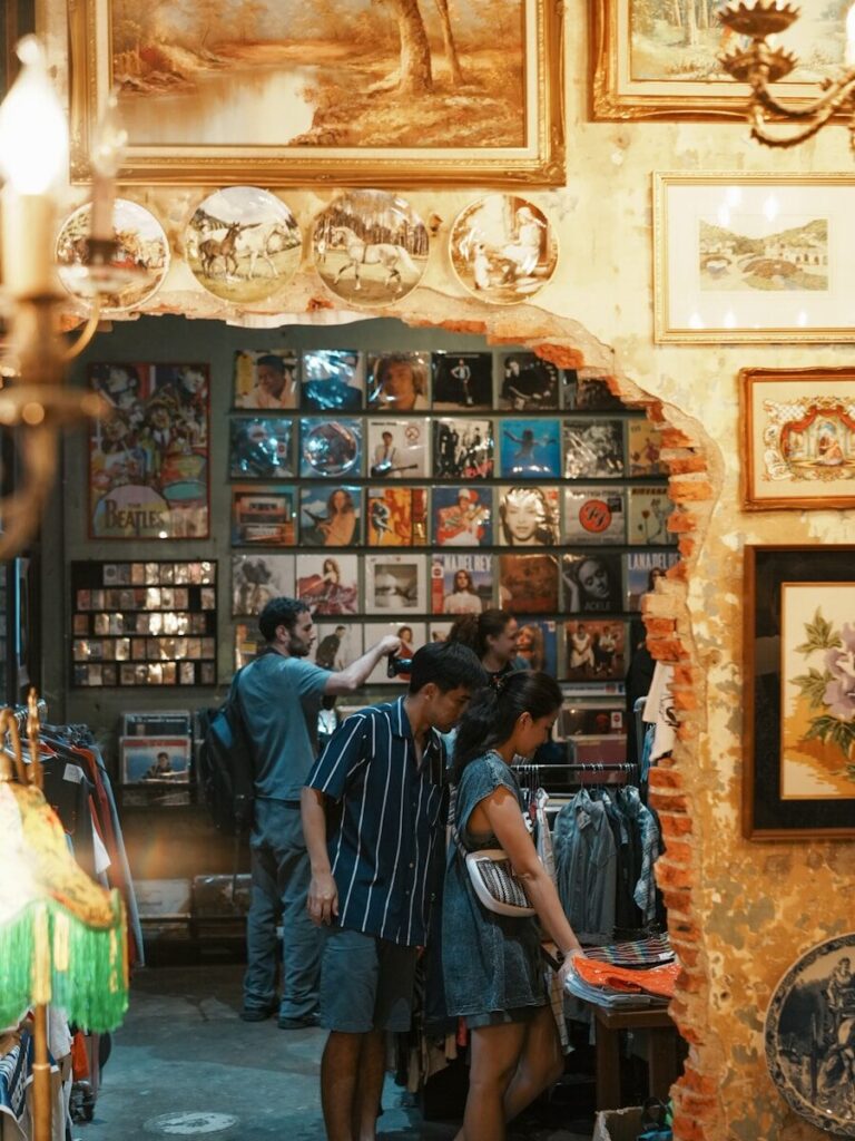 People browsing records in a vintage shop.